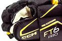 Rękawice hokejowe CCM JetSpeed FT6 Pro Black/Sunflower Senior